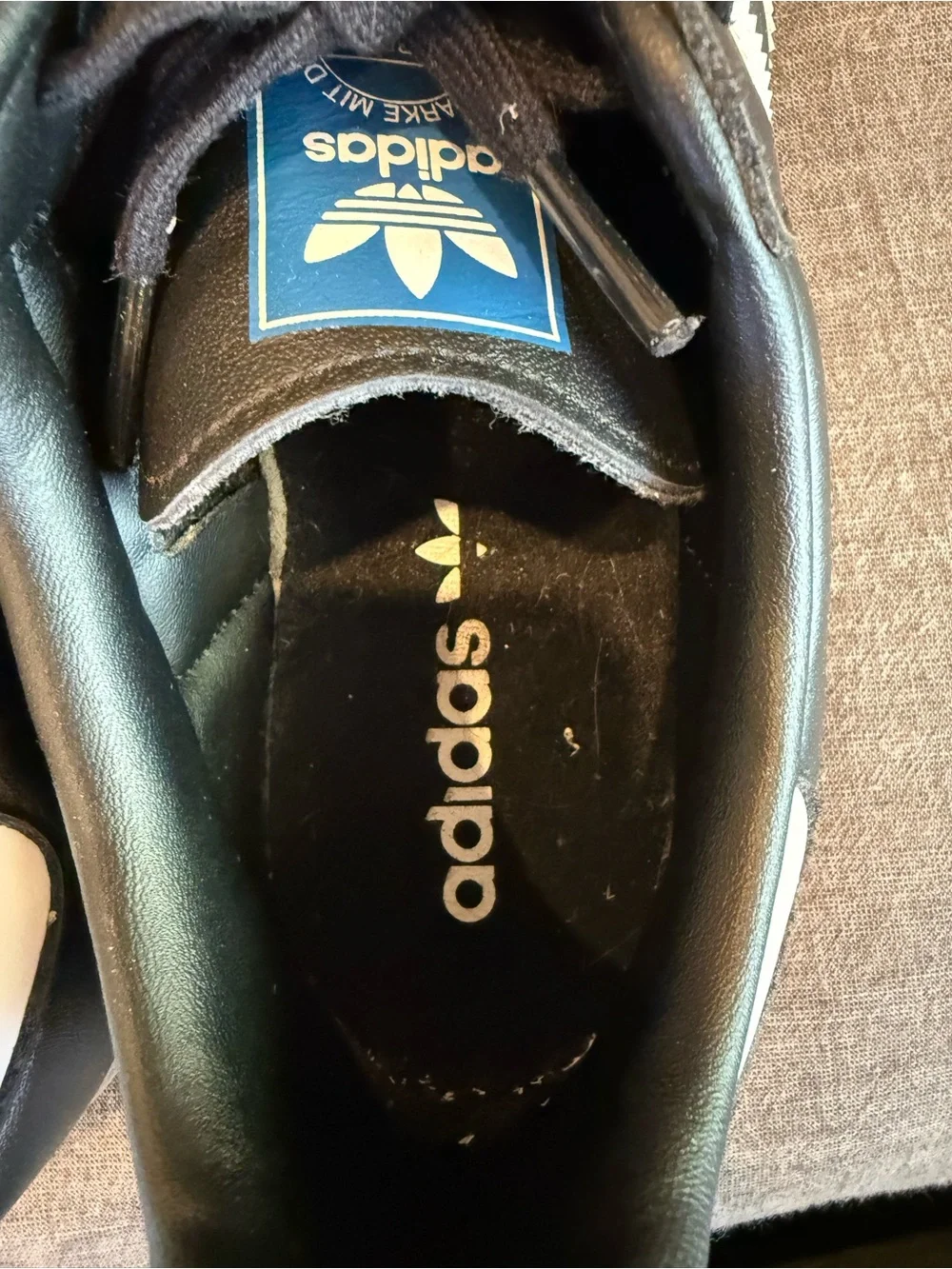 adidas Men’s Black Sneakers with White Stripes